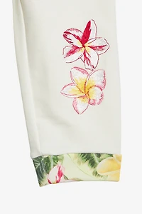 Pants With Embroidered Flowers And RC Monogram