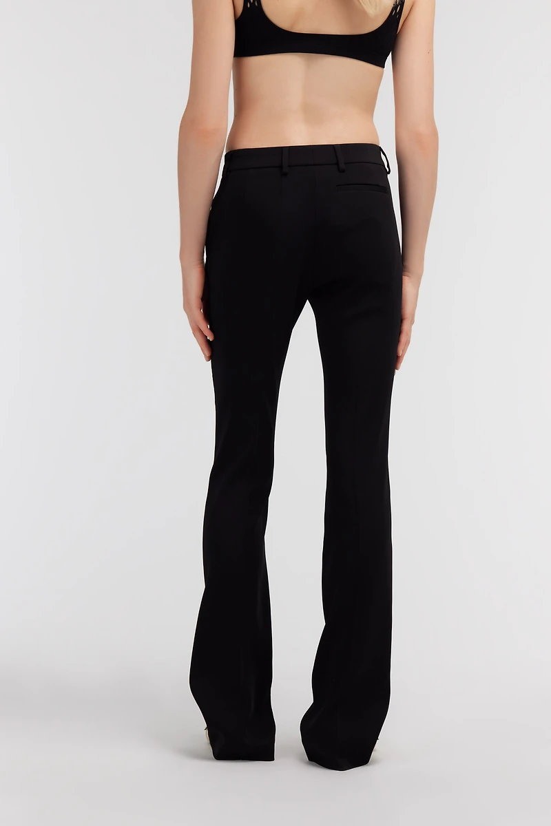 Pants with fang detail