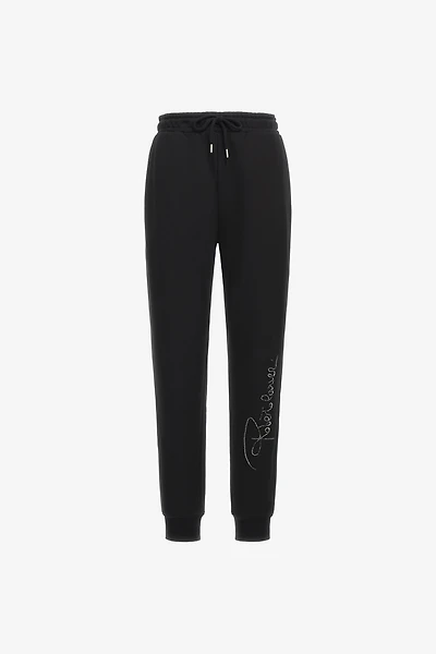 Sporty pants with signature