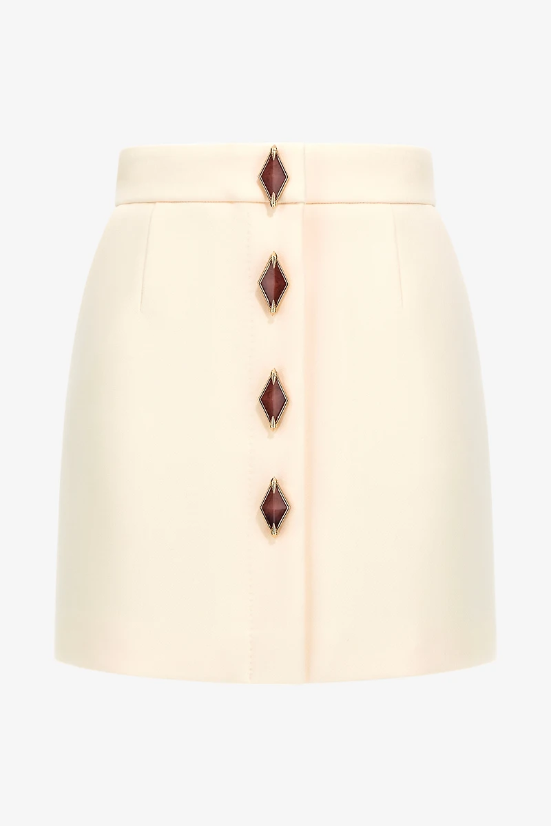 Skirt with jewels buttons