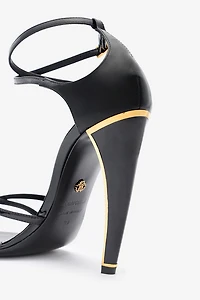Heeled sandals with Fang heel