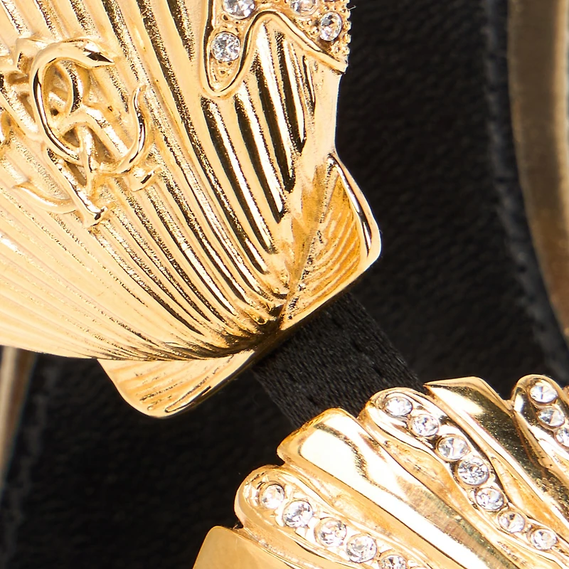 Sandals With Golden Shells
