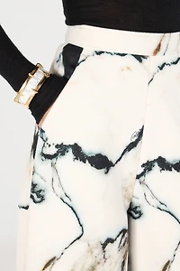 Loose flare trousers with Marble print