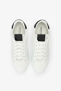 Sneakers with perforated details