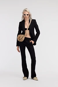 Pants with fang detail