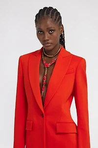 Rigid necklace with snake and decoration