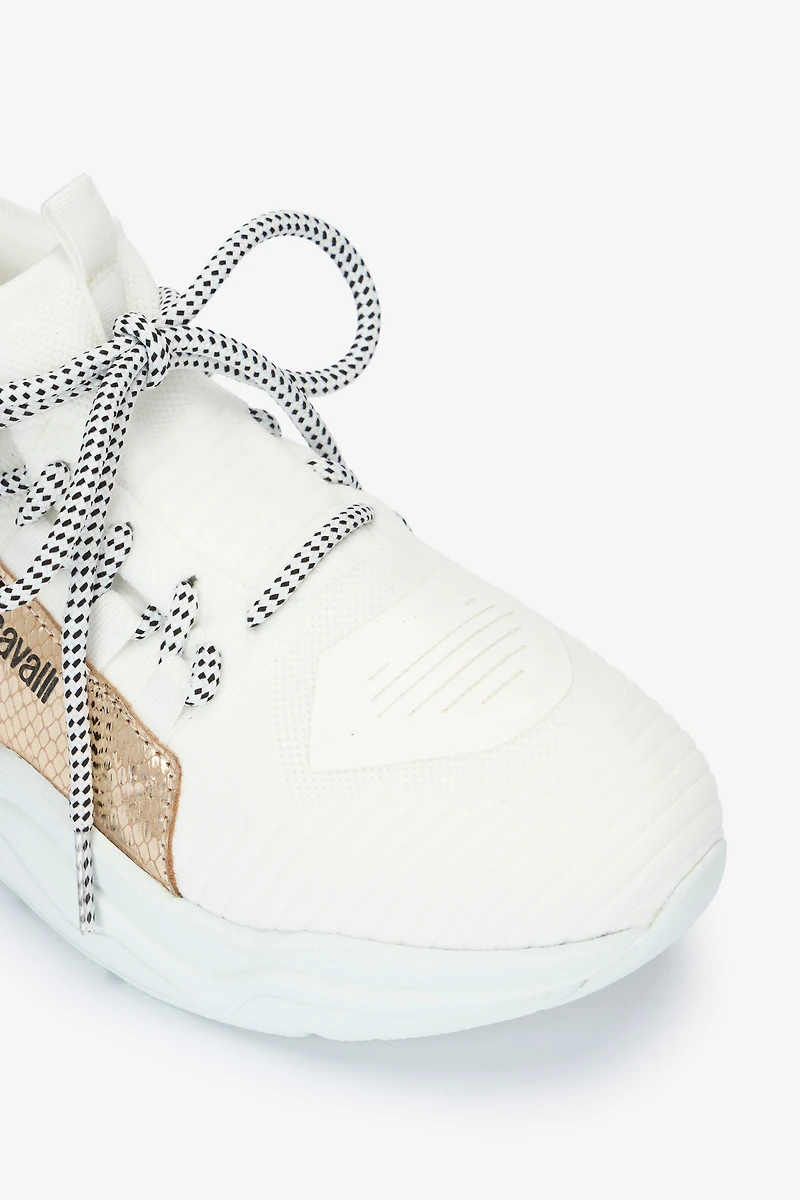 Sneakers with snake-effect inserts