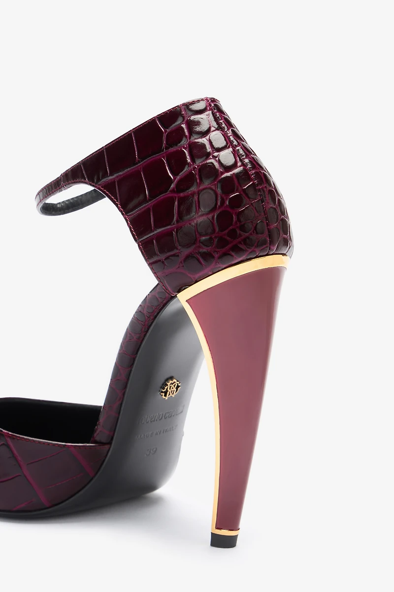 Printed leather pumps with Fang heel