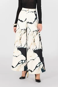 Loose flare trousers with Marble print