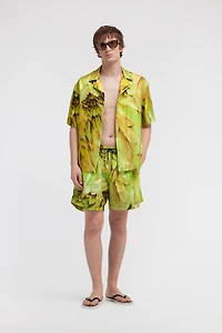 Plumange print swim trunks