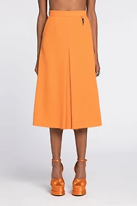 Flared wool skirt with fang pendant