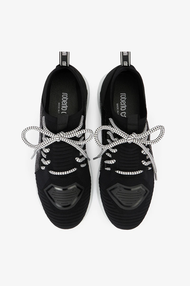 Sneakers with snake-effect inserts