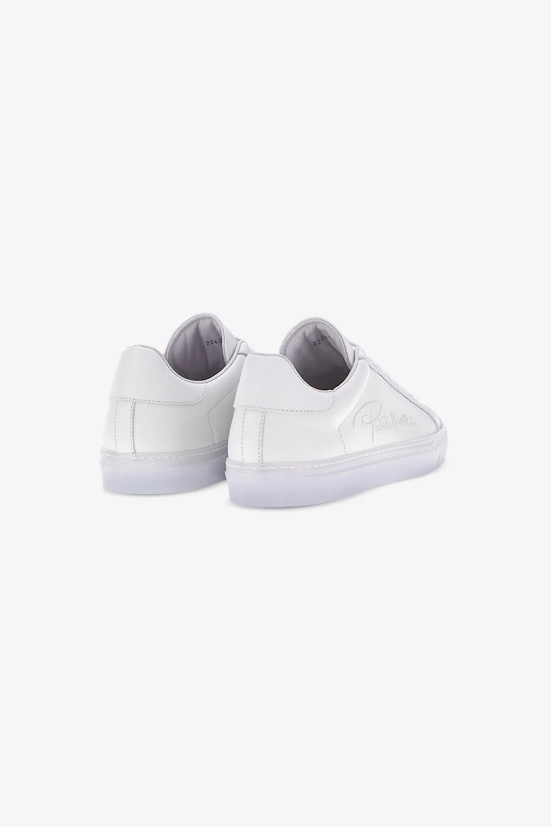 Sneakers with signature