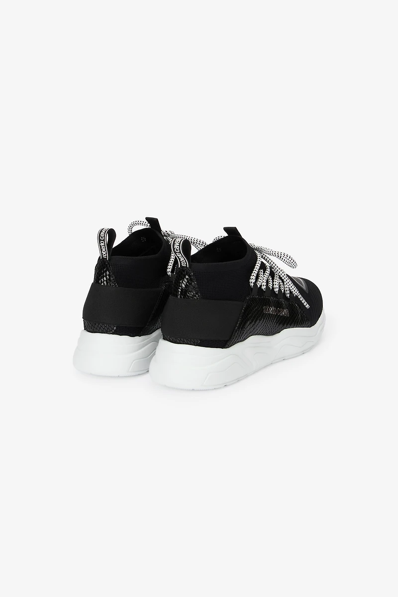 Sneakers with snake-effect inserts