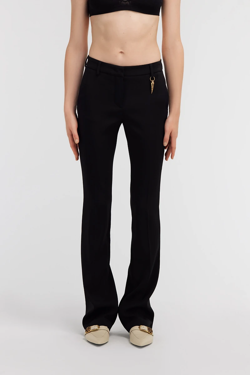 Pants with fang detail