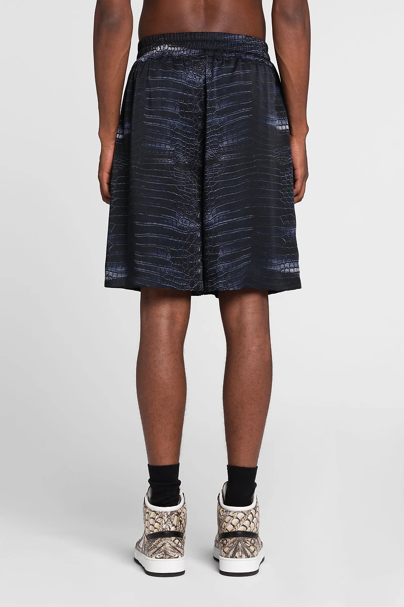 Crocodile print knee-length shorts