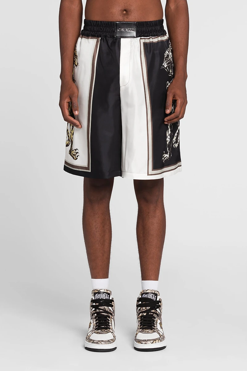 Panther-print knee-length shorts
