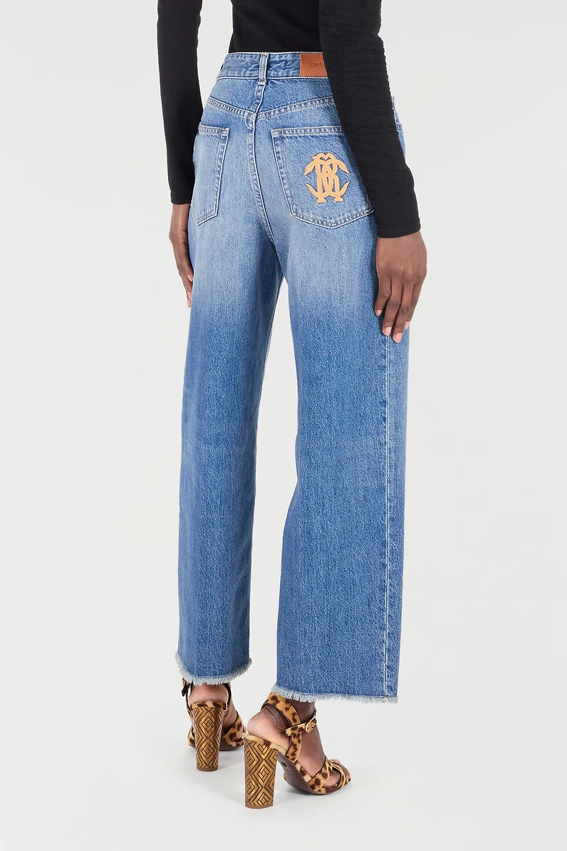 Jeans With Mirror Snake Monogram