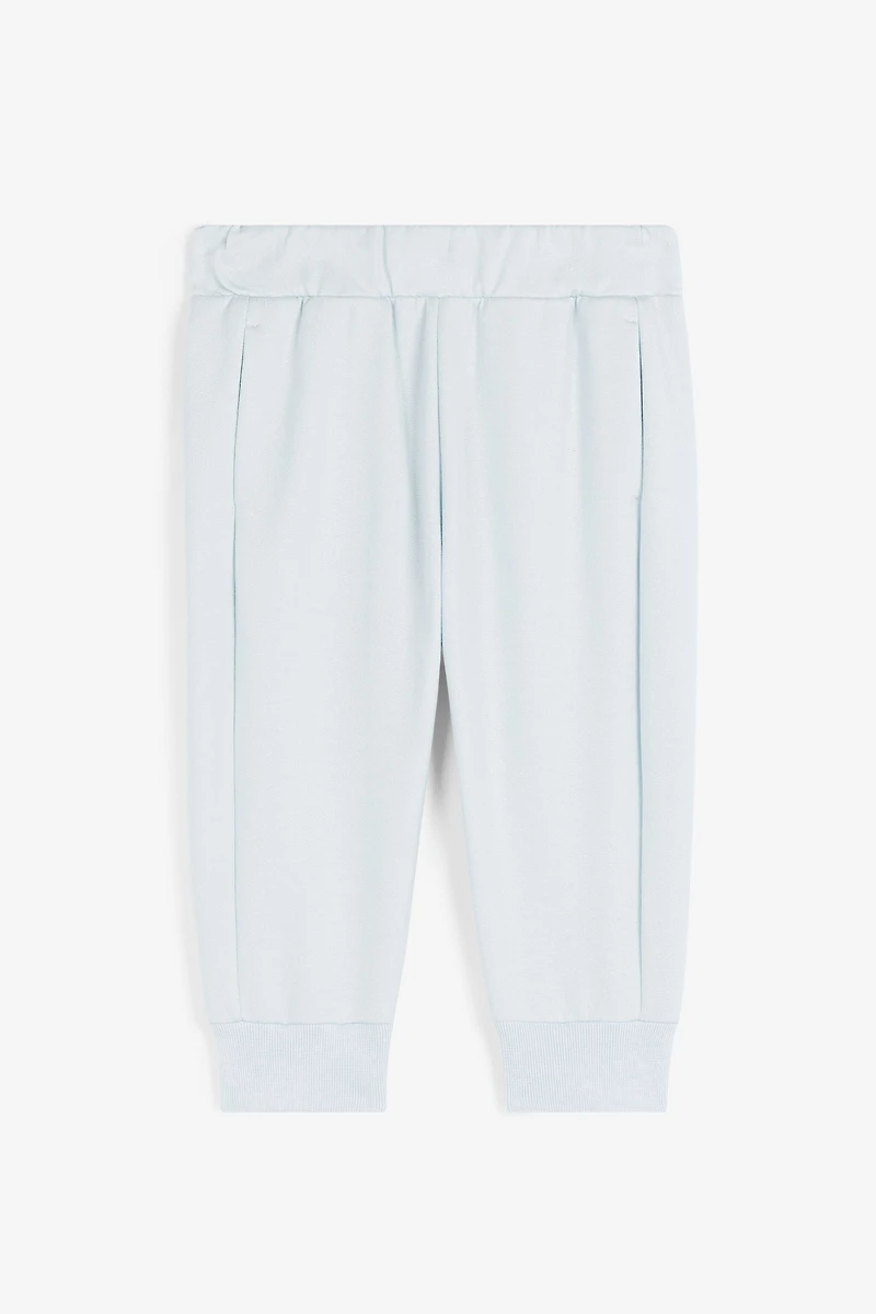 RC Monogram-Print Cotton Track Pants