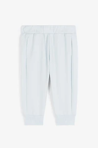 RC Monogram-Print Cotton Track Pants