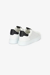 Sneakers with perforated details