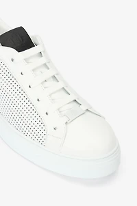 Sneakers with perforated details