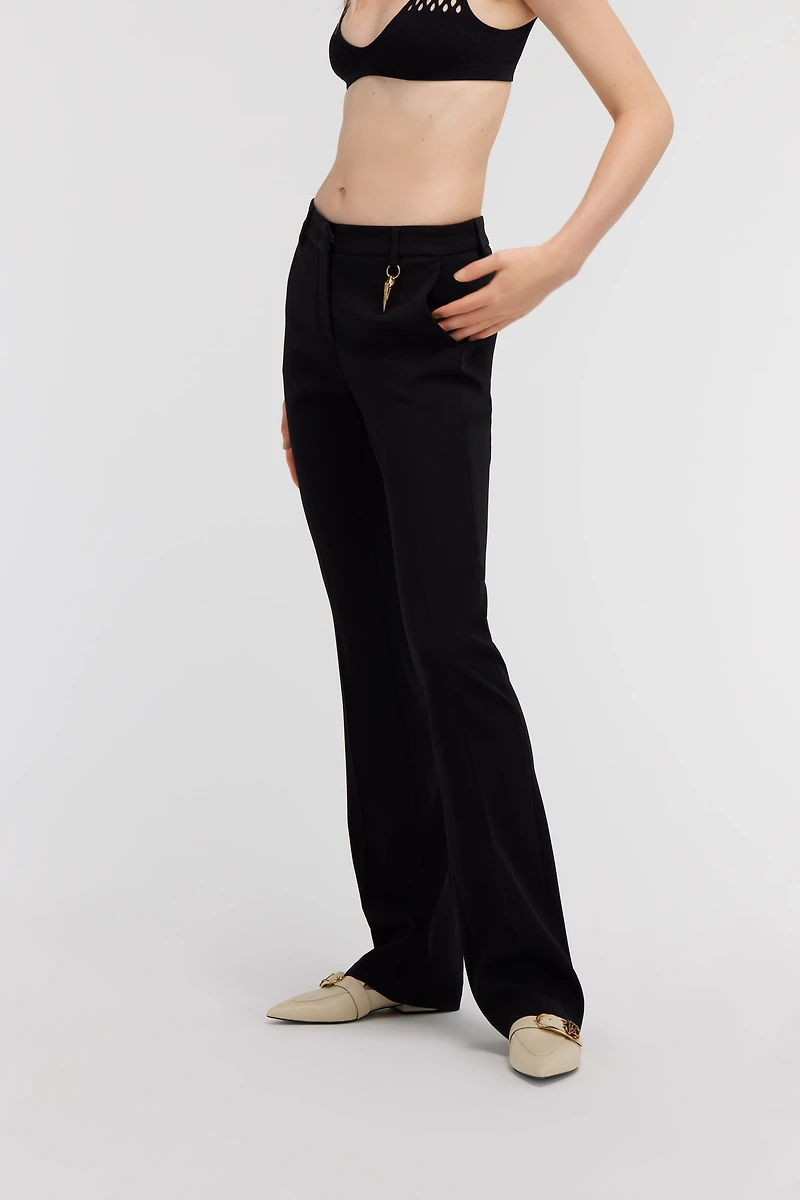 Pants with fang detail