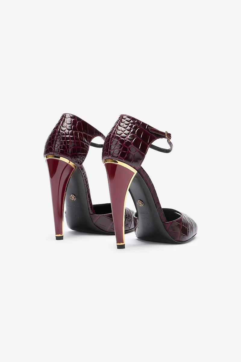 Printed leather pumps with Fang heel