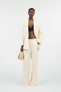 Cream Wide-Leg Trousers With Cut-Out