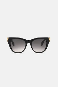 Sunglasses with feminine cat-eye and feng on sides