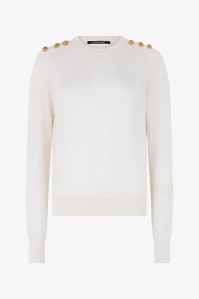 Sweater with gold buttons