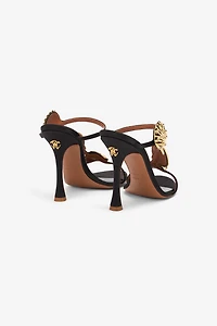 Sandals With Golden Shells