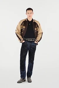 Jeans With Contrasting Discoloration Detailing