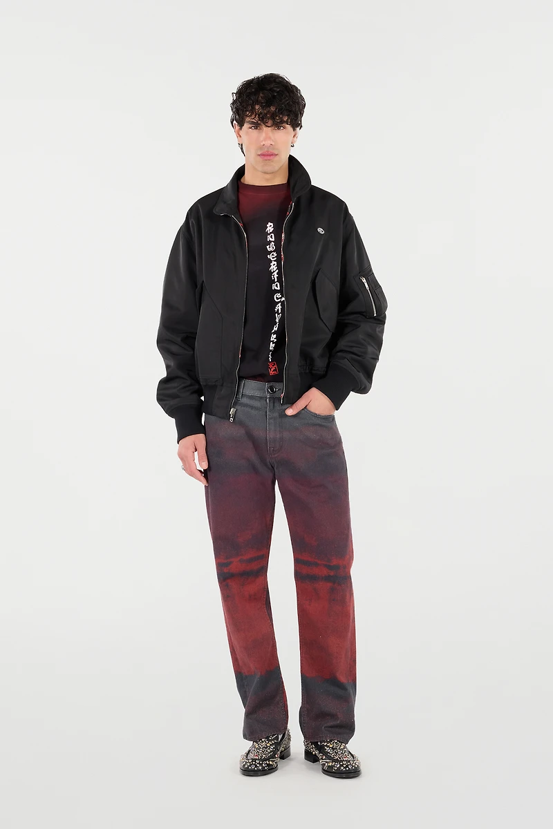 Jeans With A Mottled Print Effect