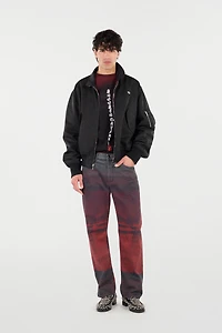 Jeans With A Mottled Print Effect
