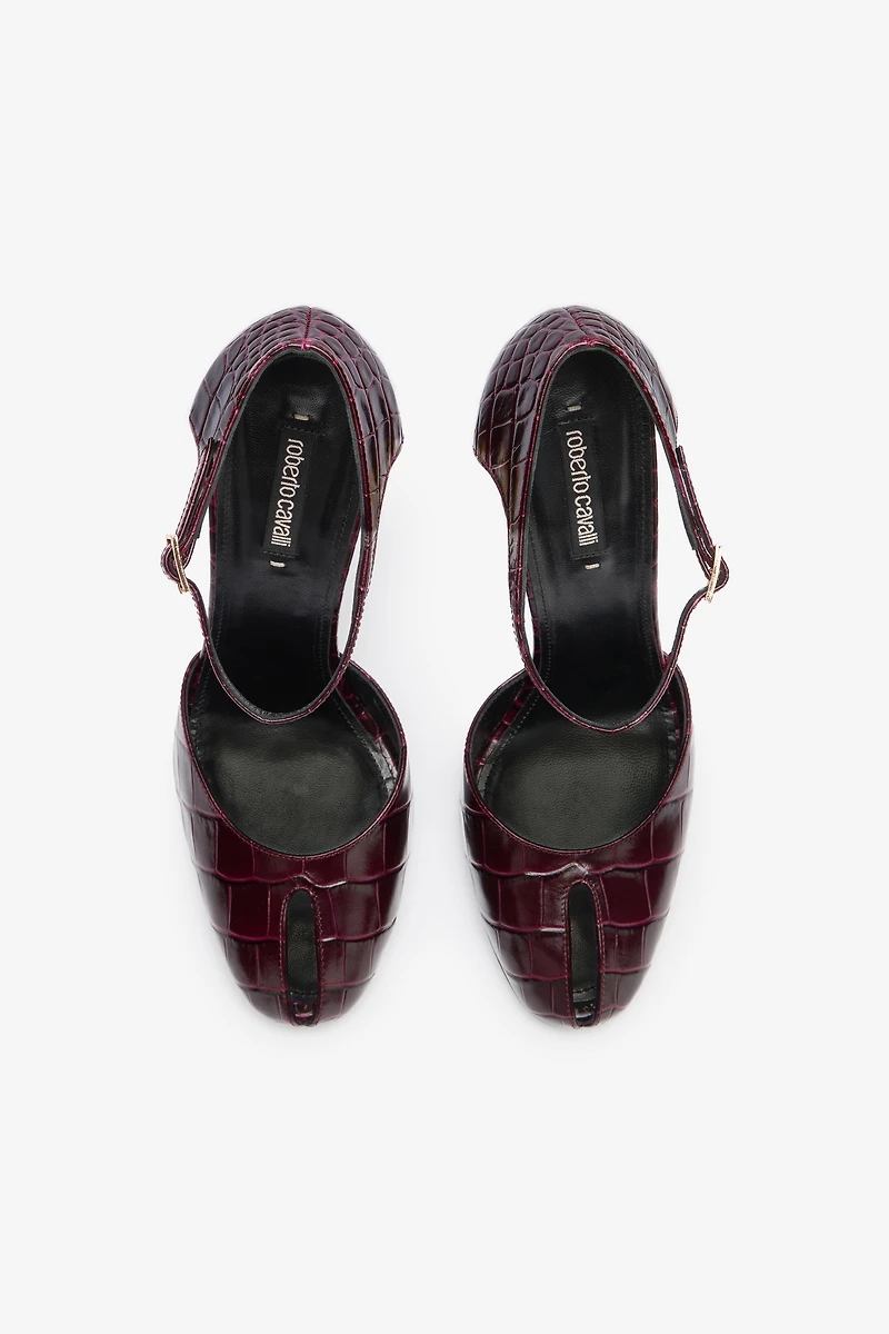 Printed leather pumps with Fang heel