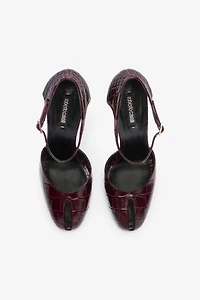 Printed leather pumps with Fang heel