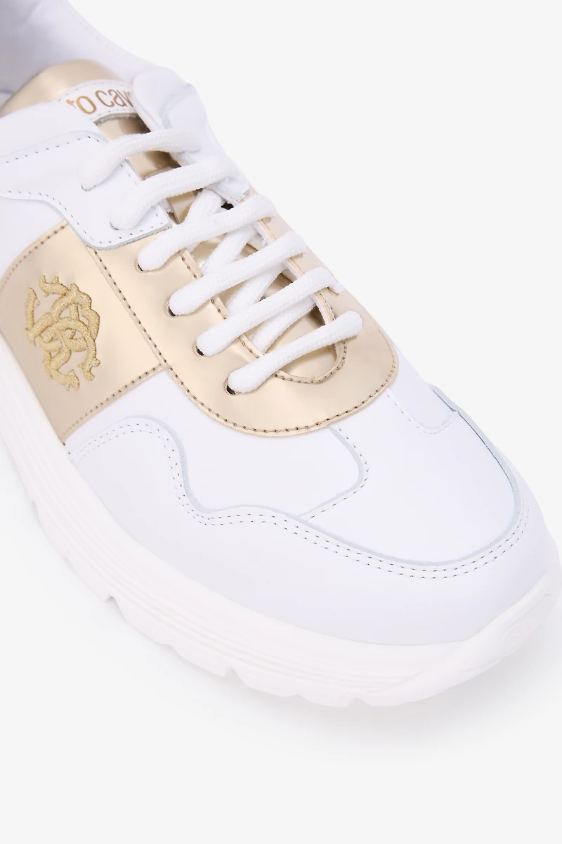 White Running Shoes With Gold Monogram RC