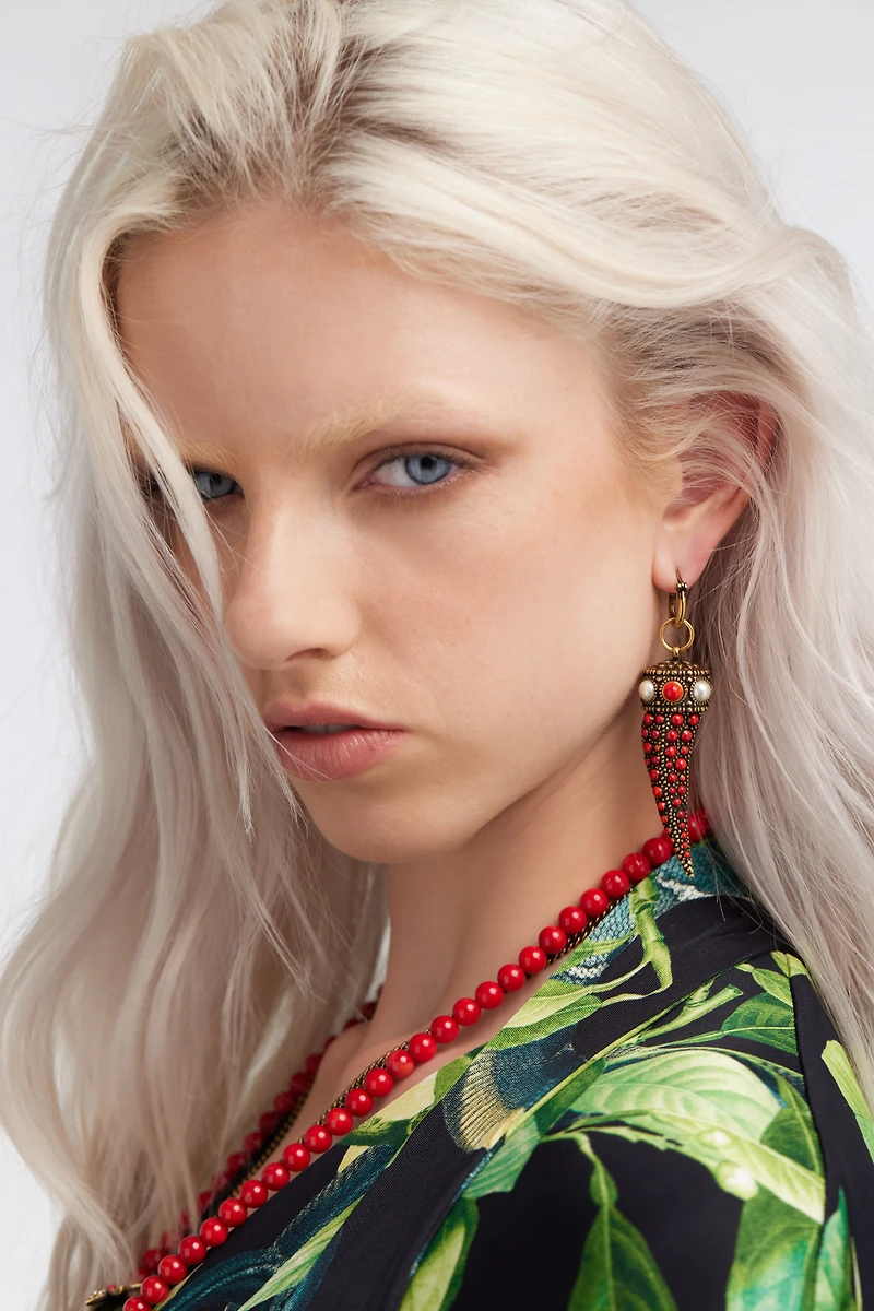 Dangling earrings with stones