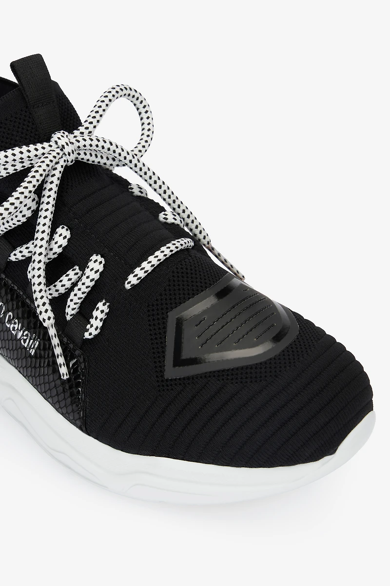 Sneakers with snake-effect inserts