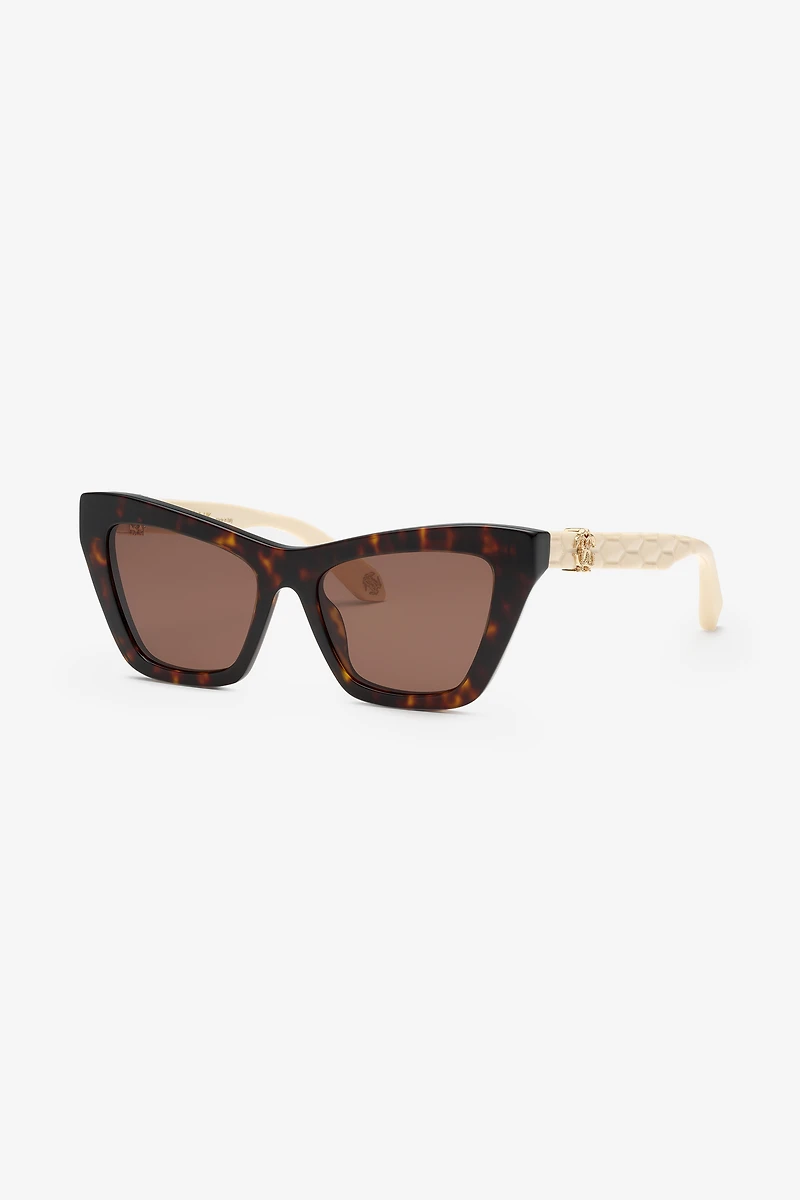 Sunglasses with smooth front and matelassè effect on temples