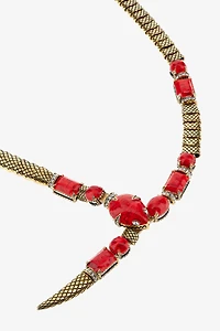 Rigid necklace with snake and decoration