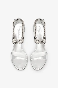 Metallic sandals with heels and tigers