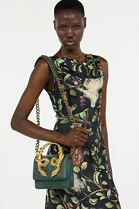 Green Bag With Snakes