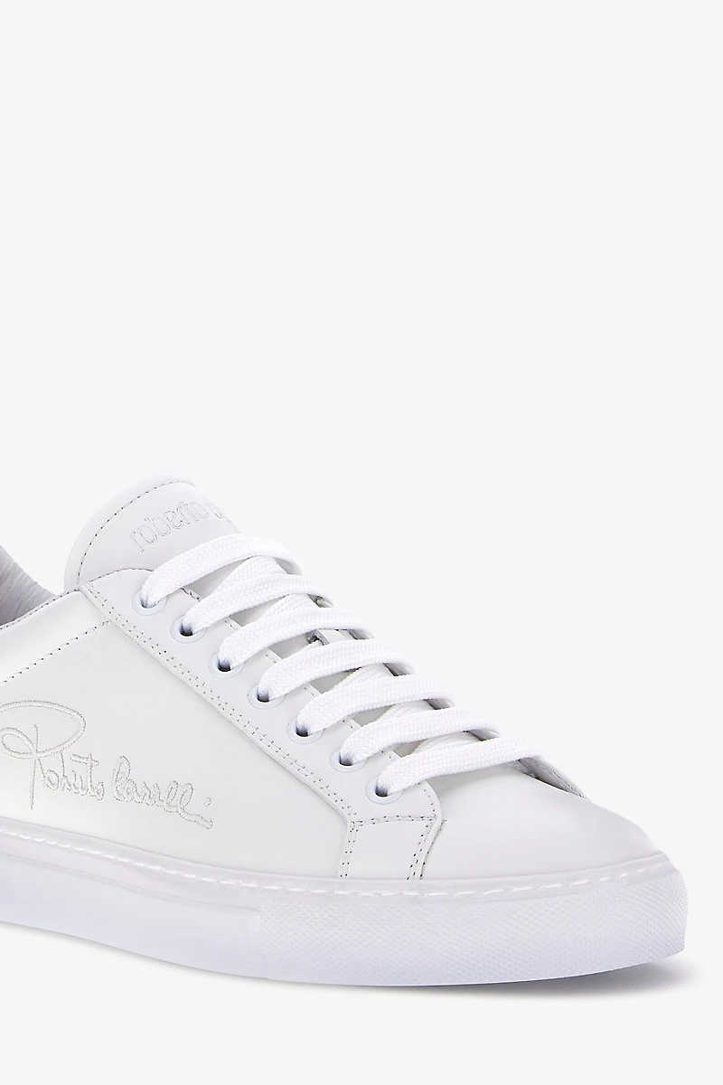 Sneakers with signature