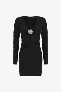 Short dress with ruffles and stones