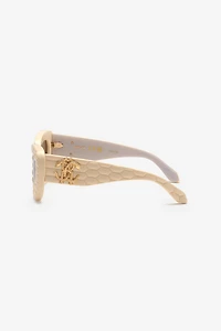 Sunglasses with wide bold cat-eye front