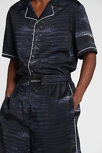 Crocodile print knee-length shorts