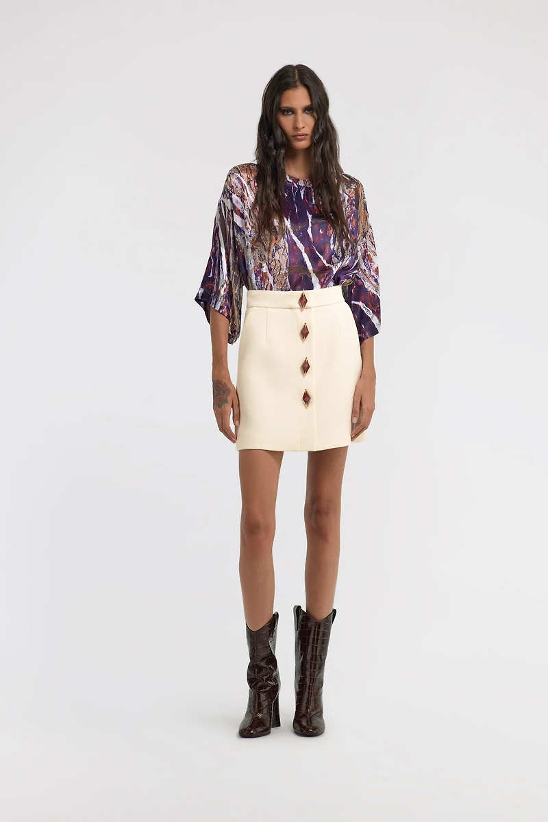 Skirt with jewels buttons