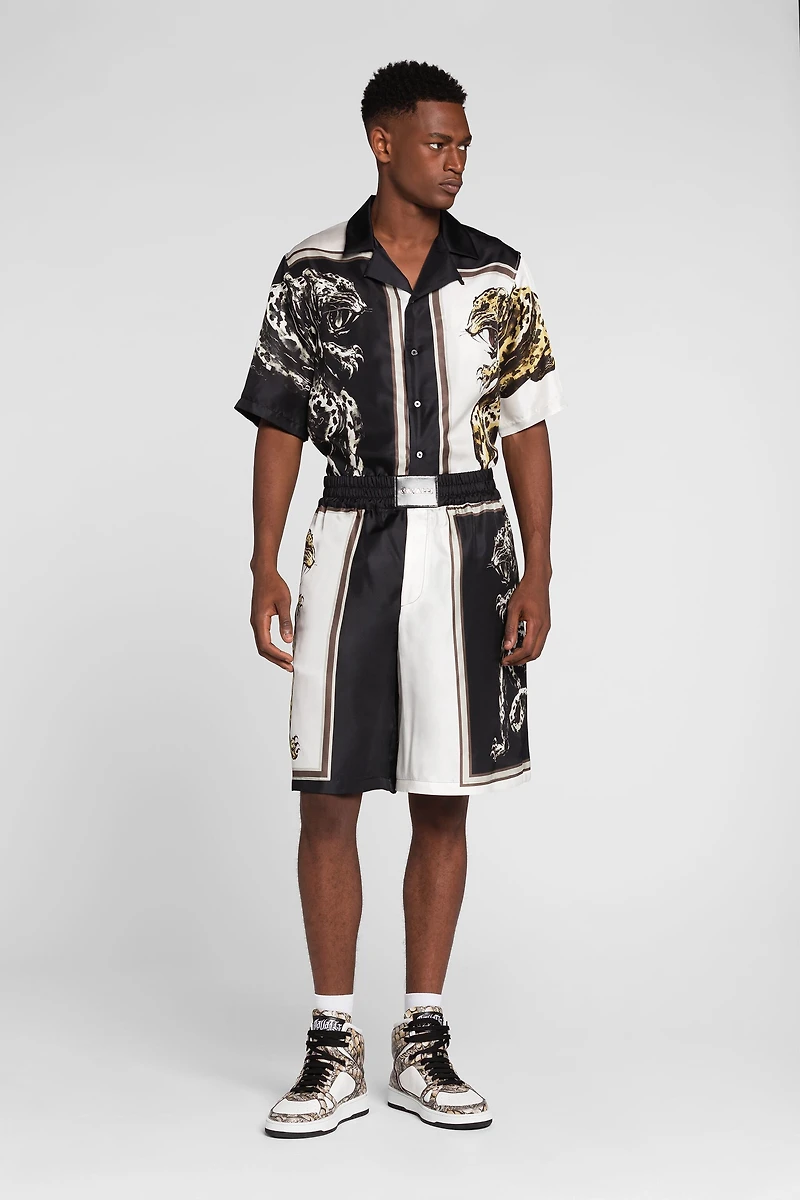 Panther-print knee-length shorts